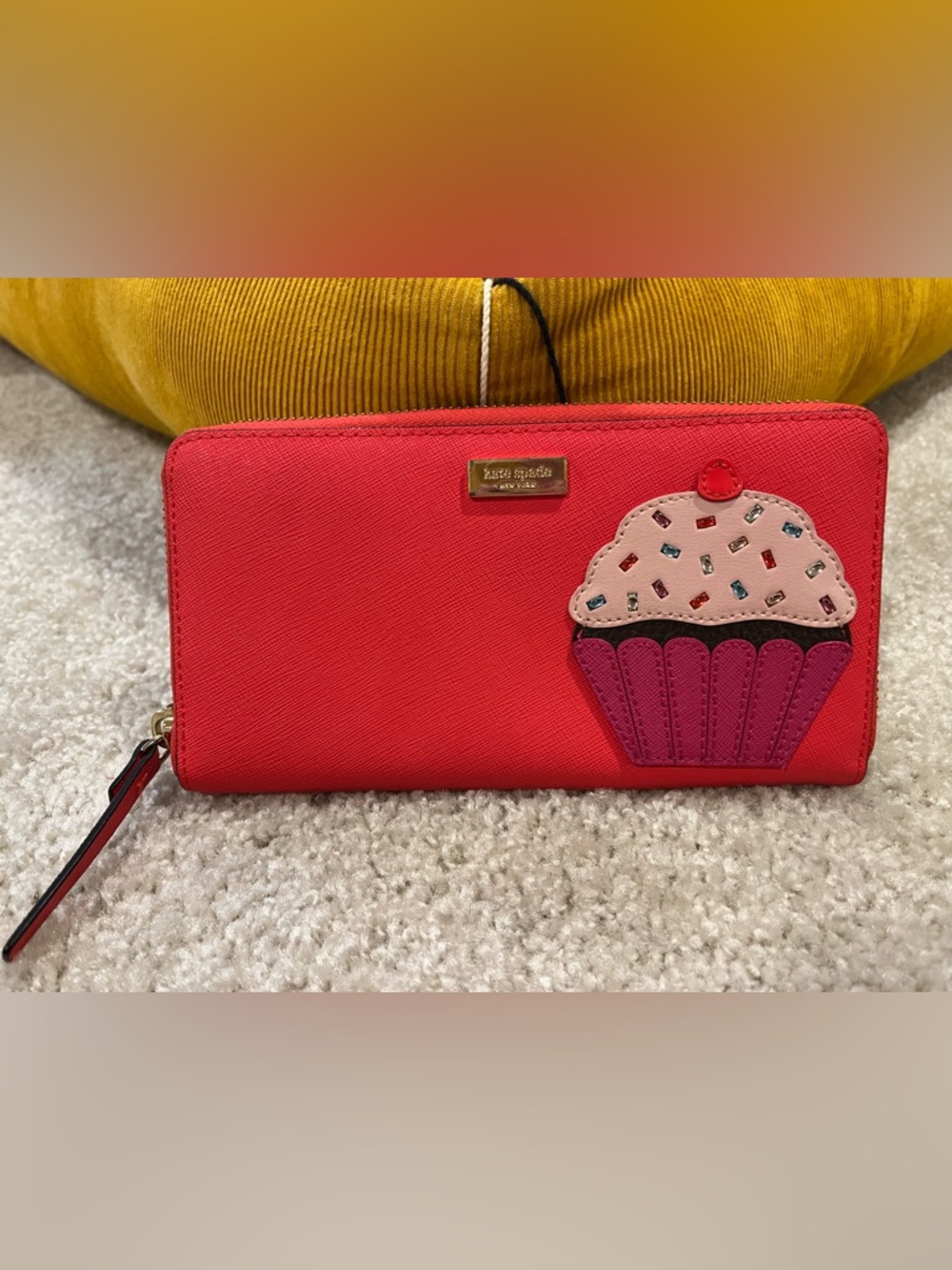 kate spade red zip-around wallet with cupcake applique